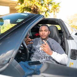 Famous Que's profile image